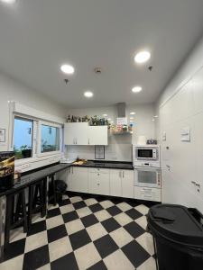 Kuchyň nebo kuchyňský kout v ubytování Hostel A2C