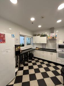 Küche/Küchenzeile in der Unterkunft Hostel A2C