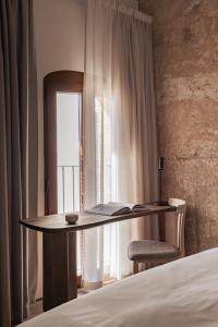 Postel nebo postele na pokoji v ubytování Nobis Hotel Palma, a Member of Design Hotels
