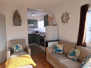 Η κουζίνα ή μικρή κουζίνα στο Homely 2-Bed Chalet in Bridlington - Free WiFi +12 φωτογραφίες