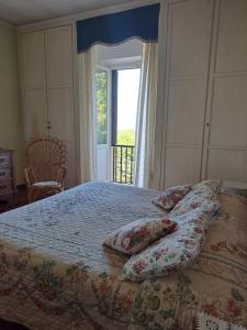 A bed or beds in a room at B&B La Dimora di Alida