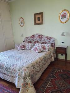 A bed or beds in a room at B&B La Dimora di Alida