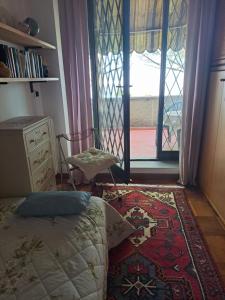 A bed or beds in a room at B&B La Dimora di Alida
