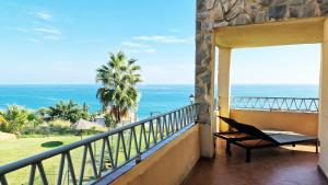 a balcony with a view of the ocean at AA Guest - Don Juan Eco Front Sea Views Apartment in Fuengirola