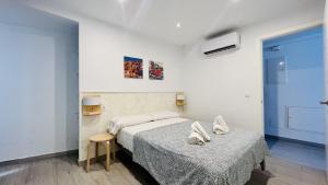 Postel nebo postele na pokoji v ubytování Apartamento Edificio Sur