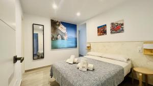 Postel nebo postele na pokoji v ubytování Apartamento Edificio Sur