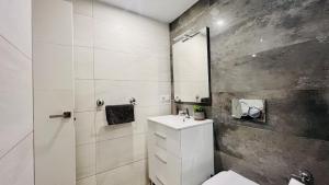 Koupelna v ubytování Apartamento Edificio Sur + 23 fotografií