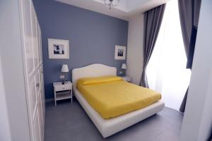 A bed or beds in a room at Rome Together Guest House
