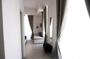 A bed or beds in a room at Rome Together Guest House