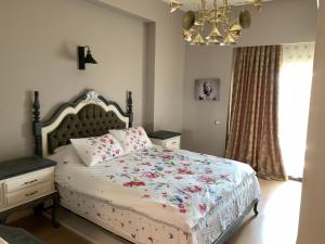 Ένα ή περισσότερα κρεβάτια σε δωμάτιο στο Luxury Flat for Embassies & GM