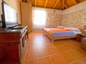 Posteľ alebo postele v izbe v ubytovaní Guesthouse Merla