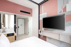 Et tv og/eller underholdning på Motto By Hilton Rotterdam Blaak