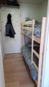 Ένα ή περισσότερα κρεβάτια σε δωμάτιο στο Appartement Ski aux pieds