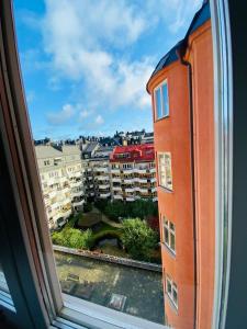 - une vue depuis la fenêtre d'un bâtiment dans l'établissement Stay Inn Apartments Norrmalm, à Stockholm