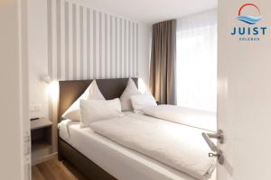 Postel nebo postele na pokoji v ubytování Haus Billstrasse 231 - Wohnung 1