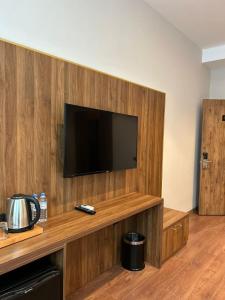 TV a/nebo společenská místnost v ubytování Sky Tower Hotel