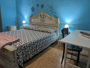 Posteľ alebo postele v izbe v ubytovaní L'ermellino Ubriaco Casa vacanza
