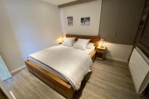 A bed or beds in a room at Le Bouquetin for 8 person
