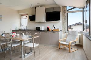 A kitchen or kitchenette at Nigella Langhe Home Még 20 kép