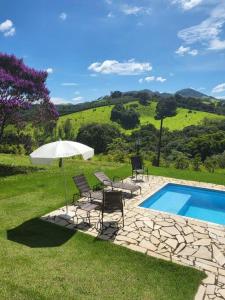 La alberca dentro o cerca de Recanto Cysne