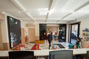 a man and a woman standing in a room at P.C. Boutique H. Castel Nuovo, by ClaPa Group Dislocated Hospitality in Naples
