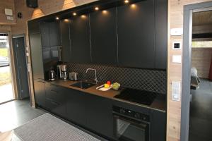 Nhà bếp/bếp nhỏ tại Villa Kanger Ruka +37 ảnh