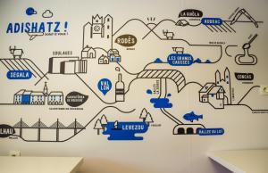 a map of a city on a wall at ibis budget Rodez in Rodez