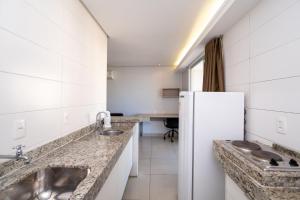 Η κουζίνα ή μικρή κουζίνα στο Onix Bueno Residence - ONX +34 φωτογραφίες