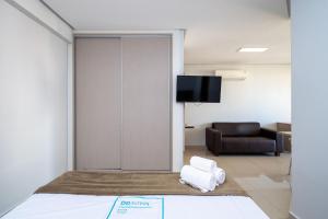 Ένα ή περισσότερα κρεβάτια σε δωμάτιο στο Onix Bueno Residence - ONX