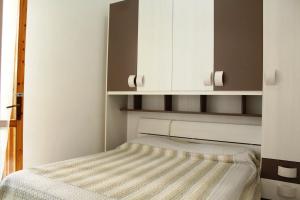 Een bed of bedden in een kamer bij Le Cotè 69