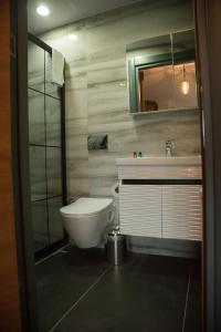 Koupelna v ubytování Ceneviz Suit Hotel + 37 fotografií