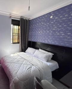Cama o camas de una habitación en Safari Lake view apartments, Muyenga