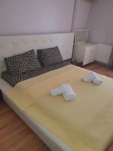 Ένα ή περισσότερα κρεβάτια σε δωμάτιο στο Bostanlı Sahile Yakın 2+1 Daire