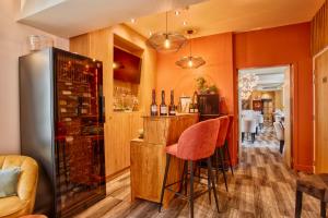 Nápoje v ubytování Le Castel Cabourg hôtel & SPA- Restaurant La Calypso