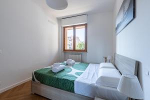 Postel nebo postele na pokoji v ubytování Cisanello Lovely Apartment in Pisa