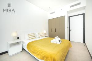 Postel nebo postele na pokoji v ubytování Mira Holiday Homes - Lovely 2 bedroom in Business Bay