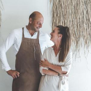 a man and a woman standing next to each other at Op Oost Boutique hotel & Restaurant het Kook Atelier in Oosterend