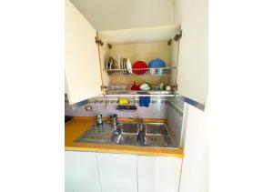 Kuchyň nebo kuchyňský kout v ubytování Cozy Casetta - Bright and near Metro C