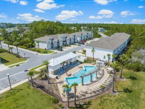 an aerial view of the resort with a pool and resort at 7654 Shadow Lake Drive - Ocean's Eleven in Panama City Beach