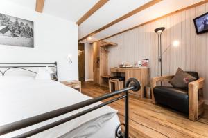 Voodi või voodid majutusasutuse Hotel Kemmeriboden-Bad AG toas