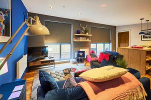 Μια τηλεόραση ή/και κέντρο ψυχαγωγίας στο Host & Stay - Ocean Blue Lodge