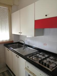Kuchyň nebo kuchyňský kout v ubytování Appartamento Casa Corrada
