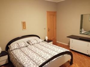 Postel nebo postele na pokoji v ubytování Appartamento Casa Corrada