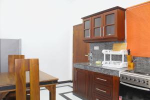 Kuchyň nebo kuchyňský kout v ubytování Villa Janaliya