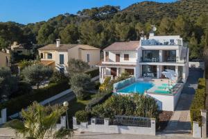 an aerial view of a house with a swimming pool at Nereo in Alcudia