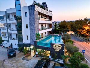 an overhead view of a hotel with a swimming pool at Ilio Boutique Hotel in Ksamil