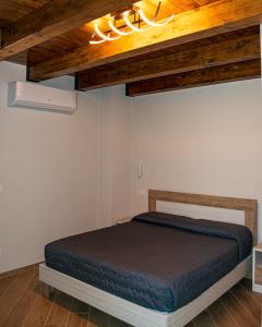 L'Antica Fontana - Casa Vacanze B&B tesisinde bir odada yatak veya yataklar