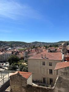 a view of a city from a building at Petit nid cosy au cœur du Puy 1 à 5 personnes in Le Puy en Velay