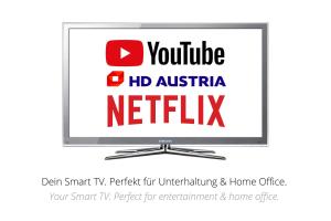 een televisiescherm met de woorden youtube hd austria netflix bij Smile Apartments “Art Collection“ in Krems an der Donau