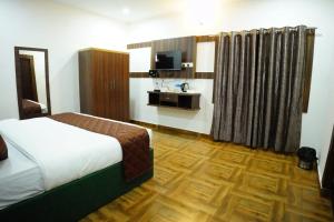 Kuchyň nebo kuchyňský kout v ubytování RICHBERRY- A Premium Plantation Villa's